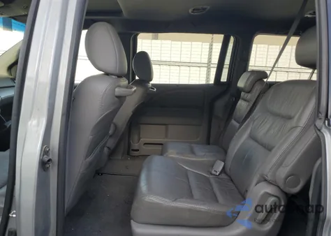 2010 Honda Odyssey Exl z USA, uszkodzony, nr VIN 5FNRL3H60AB078211